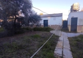 Отдельно стоящий дом с участком на продажу в городе Marchena Фото