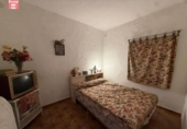 Участок с постройкой на продажу в городе Оливенса Фото