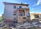 Отдельно стоящий дом с участком на продажу в городе Puente Viesgo Фото