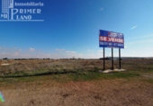 Городская земля под застройку на продажу у города Томельосо Фото