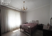 Дом с участком на продажу в городе Томельосо Фото