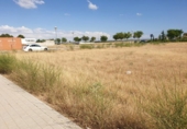 Городская земля под застройку на продажу у города Томельосо Фото