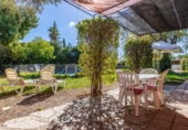 Отдельно стоящий дом с участком на продажу в городе Marchena Фото