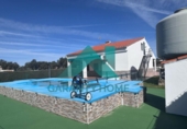 Загородный дом с участком на продажу в городе Malpartida de Cáceres Фото