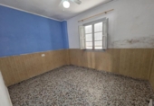 Отдельно стоящий дом с участком на продажу в городе Gandia Фото