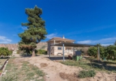 Отдельно стоящий дом с участком на продажу в городе Alhama de Murcia Фото