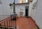 Отдельно стоящий дом с участком на продажу в городе Tossa de Mar Фото
