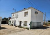 Отдельно стоящий дом с участком на продажу в городе Tortosa Фото