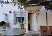 Отдельно стоящий дом с участком на продажу в городе Chiclana de la Frontera Фото