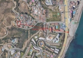 Городская земля под застройку на продажу у города Campo-Mijas Фото