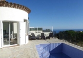 Отдельно стоящий дом с участком на продажу в городе Tossa de Mar Фото