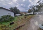 Отдельно стоящий дом с участком на продажу в городе Puenteareas Фото