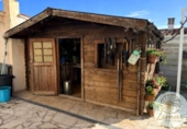 Отдельно стоящий дом с участком на продажу в городе l'Ametlla de Mar Фото