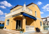 Отдельно стоящий дом с участком на продажу в городе l'Ametlla de Mar Фото