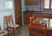 Отдельно стоящий дом с участком на продажу в городе La Vall d'Uixó Фото