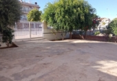 Отдельно стоящий дом с участком на продажу в городе Los Alcázares Фото