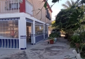 Отдельно стоящий дом с участком на продажу в городе Los Alcázares Фото