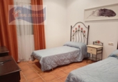 Отдельно стоящий дом с участком на продажу в городе Cartaya Фото