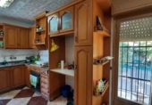 Отдельно стоящий дом с участком на продажу в городе Crevillente Фото