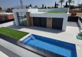 Отдельно стоящий дом с участком на продажу в городе Alhama de Murcia Фото