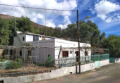 Отдельно стоящий дом с участком на продажу в городе San Bartolomé de Tirajana Фото