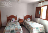 Отдельно стоящий дом с участком на продажу в городе San Bartolomé de Tirajana Фото