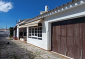 Отдельно стоящий дом с участком на продажу в городе l'Ametlla de Mar Фото