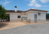Отдельно стоящий дом с участком на продажу в городе Ontinyent Фото