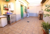 Отдельно стоящий дом с участком на продажу в городе San Juan del Puerto Фото