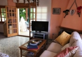 Отдельно стоящий дом с участком на продажу в городе Calafell Фото