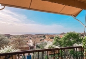 Отдельно стоящий дом с участком на продажу в городе Benalmádena Фото