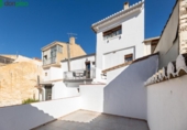 Дом с участком на продажу в городе Alhama de Granada Фото