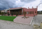 Отдельно стоящий дом с участком на продажу в городе Tortosa Фото