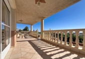 Отдельно стоящий дом с участком на продажу в городе San Juan de los Terreros Фото
