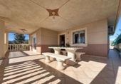 Отдельно стоящий дом с участком на продажу в городе San Juan de los Terreros Фото