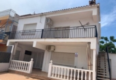 Отдельно стоящий дом с участком на продажу в городе l'Ametlla de Mar Фото