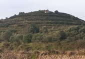 Земля на продажу у города Teulada Фото