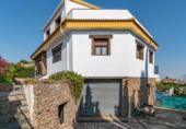 Отдельно стоящий дом с участком на продажу в городе Villa de Otura Фото