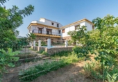 Отдельно стоящий дом с участком на продажу в городе Villa de Otura Фото