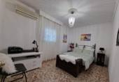 Отдельно стоящий дом с участком на продажу в городе Chiclana de la Frontera Фото