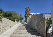 Отдельно стоящий дом с участком на продажу в городе Chiclana de la Frontera Фото