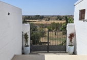 Отдельно стоящий дом с участком на продажу в городе Chiclana de la Frontera Фото
