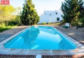 Отдельно стоящий дом с участком на продажу в городе Ayamonte Фото