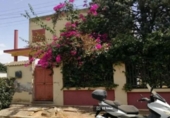 Отдельно стоящий дом с участком на продажу в городе Alcalá de Guadaíra Фото