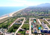 Отдельно стоящий дом с участком на продажу в городе Oliva Фото