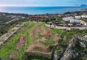 Земля на продажу у города Manilva Фото