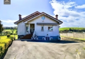 Отдельно стоящий дом с участком на продажу в городе Suances Фото