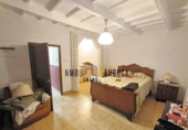 Отдельно стоящий дом с участком на продажу в городе Ciutadella de Menorca Фото