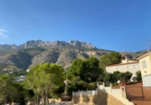 Отдельно стоящий дом с участком на продажу в городе Altea Фото