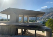 Отдельно стоящий дом с участком на продажу в городе Altea Фото
